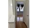 Upper hallway with doors to bedrooms and light-colored walls at 12031 Villanova Dr # 110, Orlando, FL 32837