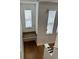Small hallway with granite countertop and window at 12031 Villanova Dr # 110, Orlando, FL 32837