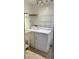Laundry room with washer, dryer and shelving at 12031 Villanova Dr # 110, Orlando, FL 32837
