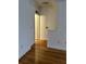 Hardwood floor hallway with access to bathroom at 12031 Villanova Dr # 110, Orlando, FL 32837