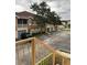 Exterior view of building and parking lot at 12031 Villanova Dr # 110, Orlando, FL 32837