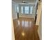Bright living room with hardwood floors and a fireplace at 12031 Villanova Dr # 110, Orlando, FL 32837