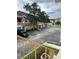 Community view showcasing building exteriors, parking, and landscaping at 12031 Villanova Dr # 110, Orlando, FL 32837