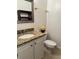 Clean bathroom with granite countertop and white cabinets at 12031 Villanova Dr # 110, Orlando, FL 32837