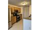 Well-equipped kitchen with stainless steel appliances at 12031 Villanova Dr # 110, Orlando, FL 32837