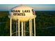 Aerial view of Indian Lake Estates water tower, showcasing community landmark at 2851 Palm Ave, Indian Lake Estates, FL 33855