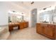 Elegant bathroom with dual vanities and soaking tub at 335 Brookhaven Pl, Lake Mary, FL 32746