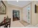 Bright entryway with view into an office or den at 7067 Sw 91St Ct, Ocala, FL 34481