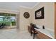 Home office features built-in desk, view of backyard, and plenty of natural light at 7067 Sw 91St Ct, Ocala, FL 34481