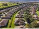 Aerial view of houses in a neighborhood at 7067 Sw 91St Ct, Ocala, FL 34481