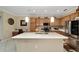 Updated kitchen featuring an island with seating and stainless steel appliances at 7067 Sw 91St Ct, Ocala, FL 34481