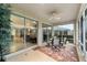 Bright and airy screened porch with backyard access at 7067 Sw 91St Ct, Ocala, FL 34481