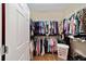 Large walk-in closet with ample hanging space and shelving at 7067 Sw 91St Ct, Ocala, FL 34481