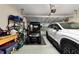 Attached garage with space for golf cart and a car at 7067 Sw 91St Ct, Ocala, FL 34481