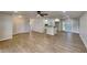 Open concept living area with new flooring and a breakfast bar at 1737 Jacobs Rd, South Daytona, FL 32119