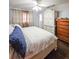 Large bedroom with a king-size bed and lots of natural light at 1140 E George St, Bartow, FL 33830