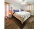 Main bedroom with a king-size bed and ample closet space at 1140 E George St, Bartow, FL 33830