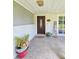 Inviting front entrance with tiled flooring and potted plants at 1140 E George St, Bartow, FL 33830