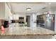 Spacious kitchen featuring granite countertops and stainless steel appliances at 1140 E George St, Bartow, FL 33830