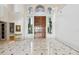 Elegant entryway featuring double doors and marble floors at 9202 Bay Point Dr, Orlando, FL 32819