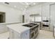 Gourmet kitchen with island and high-end appliances at 9202 Bay Point Dr, Orlando, FL 32819