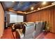Home theater with leather seating and large screen at 9202 Bay Point Dr, Orlando, FL 32819