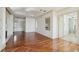 Spacious bedroom with hardwood floors and access to bathroom at 9202 Bay Point Dr, Orlando, FL 32819
