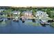 Luxury lakefront home at sunset at 9202 Bay Point Dr, Orlando, FL 32819