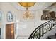 View of a grand staircase and entryway with chandelier at 9202 Bay Point Dr, Orlando, FL 32819