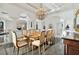 Formal dining room with a large table and chandelier at 9202 Bay Point Dr, Orlando, FL 32819