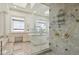 Large bathroom with walk-in shower and soaking tub at 9202 Bay Point Dr, Orlando, FL 32819