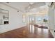 Spacious main bedroom with hardwood floors, fireplace and water views at 9202 Bay Point Dr, Orlando, FL 32819