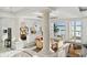Living area with water views and access to patio at 9202 Bay Point Dr, Orlando, FL 32819