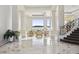 Spacious living room with water views and marble floors at 9202 Bay Point Dr, Orlando, FL 32819