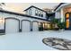 Three-car garage with decorative driveway at 9202 Bay Point Dr, Orlando, FL 32819
