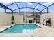 Enjoy your own private pool, complete with a grilling station and covered patio at 2174 Fleming Mist Pl, Kissimmee, FL 34747
