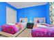 Two twin beds with Frozen bedding in a blue themed bedroom at 2174 Fleming Mist Pl, Kissimmee, FL 34747