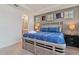 Spacious bedroom with king-size bed and ensuite bathroom at 2174 Fleming Mist Pl, Kissimmee, FL 34747