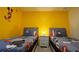 Mickey Mouse-themed bedroom with twin beds at 2174 Fleming Mist Pl, Kissimmee, FL 34747