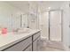Bathroom with a shower, toilet, and vanity at 2174 Fleming Mist Pl, Kissimmee, FL 34747