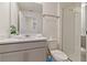 Bathroom with shower, toilet and vanity at 2174 Fleming Mist Pl, Kissimmee, FL 34747