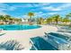 Relaxing pool area with plenty of lounge chairs at 2174 Fleming Mist Pl, Kissimmee, FL 34747