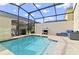 Private pool and patio area with seating at 2174 Fleming Mist Pl, Kissimmee, FL 34747