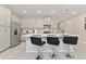 Modern kitchen with stainless steel appliances and an island at 2174 Fleming Mist Pl, Kissimmee, FL 34747