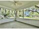 Spacious screened porch overlooking a tree-lined street at 540 Francis Blvd, Lakeland, FL 33801