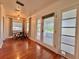 Inviting entryway with hardwood floors and French doors leading to a porch at 540 Francis Blvd, Lakeland, FL 33801