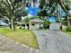 White ranch home with carport and large backyard at 540 Francis Blvd, Lakeland, FL 33801