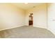 Neutral bedroom with plush carpeting and an ensuite bathroom at 406 Tortosa Ct, Davenport, FL 33837