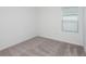 Spacious bedroom with neutral wall and carpet at 2292 Cypress Creek St, Auburndale, FL 33823