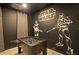 Game room with foosball table and Star Wars mural at 2857 Bookmark Dr, Kissimmee, FL 34746
